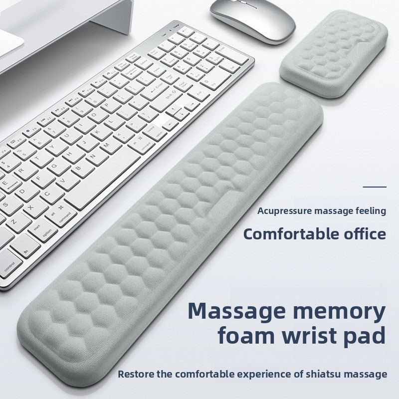 Deskfriend Wrist Support Pad in use supporting a wrist at the keyboard
