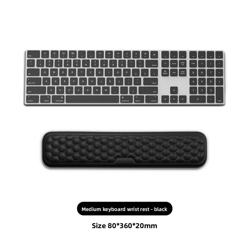 Deskfriend Wrist Support Pad in use supporting a wrist at the keyboard