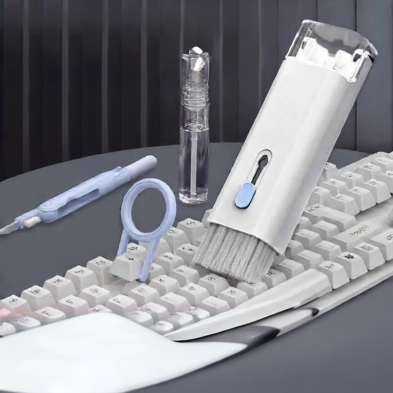 Deskfriend 7-in-1 Desk Cleaning Kit cleaning fluid on a laptop screen
