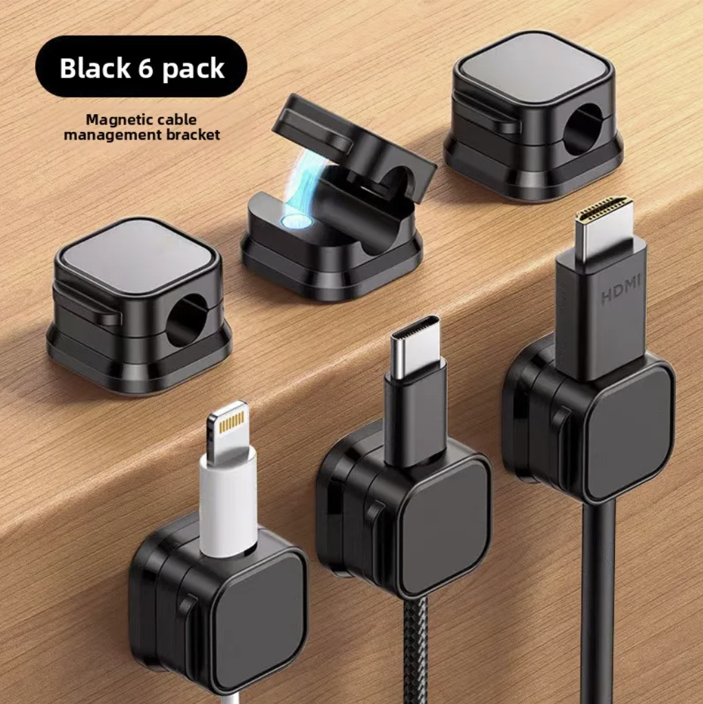 Deskfriend Magnetic Cable Clips holding a charging cable upright on a desk